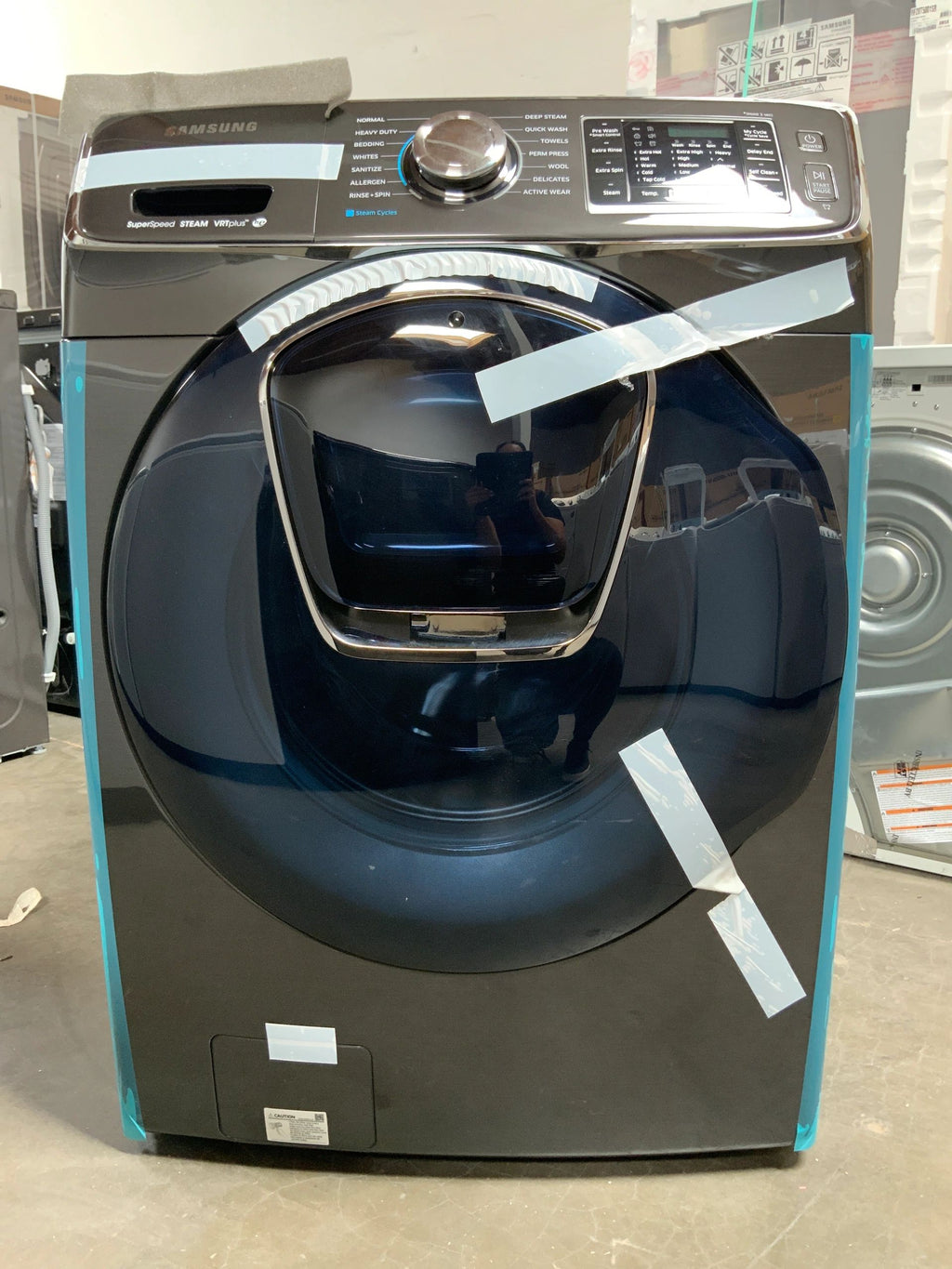 New Dent and Scratch. 4.5 cu. ft. High-Efficiency Front Load Washer with Steam and AddWash Door in Black Stainless, ENERGY STAR. Model: WF45K6500AV