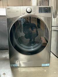 New Dent and Scratch. LG Dryer 7.4 cu. ft. Graphite Steel Ultra Large Capacity Gas Dryer with Sensor Dry. Model: DLG3601V