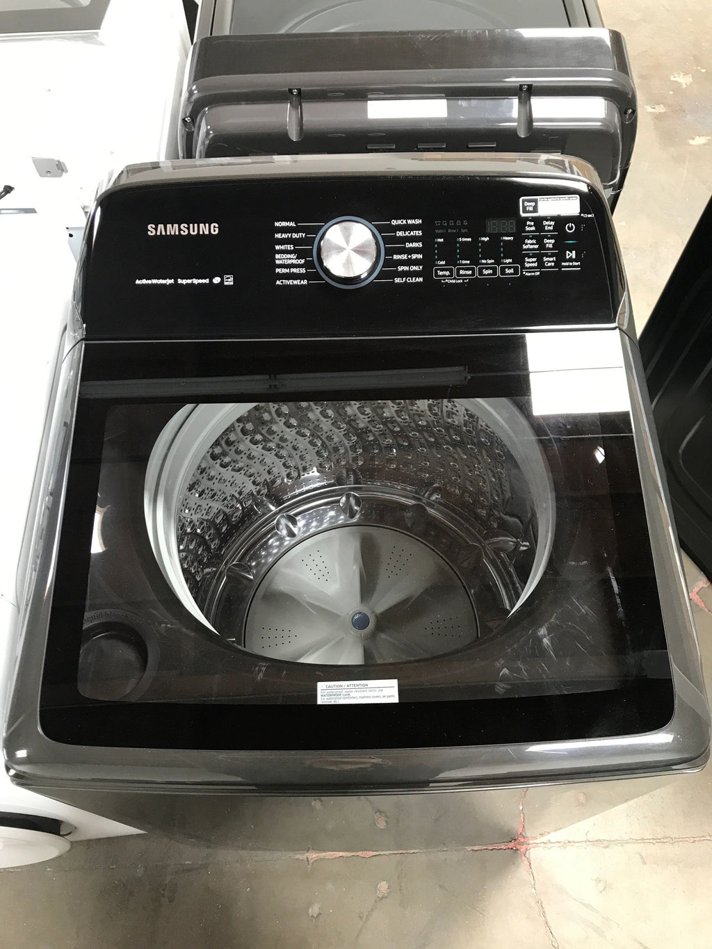 NEW Scratch & Dent. 5.0 cu. ft. Hi-Efficiency Fingerprint Resistant Black Stainless Top Load Washing Machine with Super Speed, ENERGY STAR. Model: WA50R5400AV