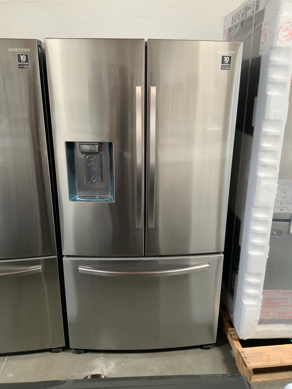 New Dent and Scratch. Samsung 27 cu. ft. French Door Refrigerator in Fingerprint Resistant Stainless Steel. Model: RF27T5201SR