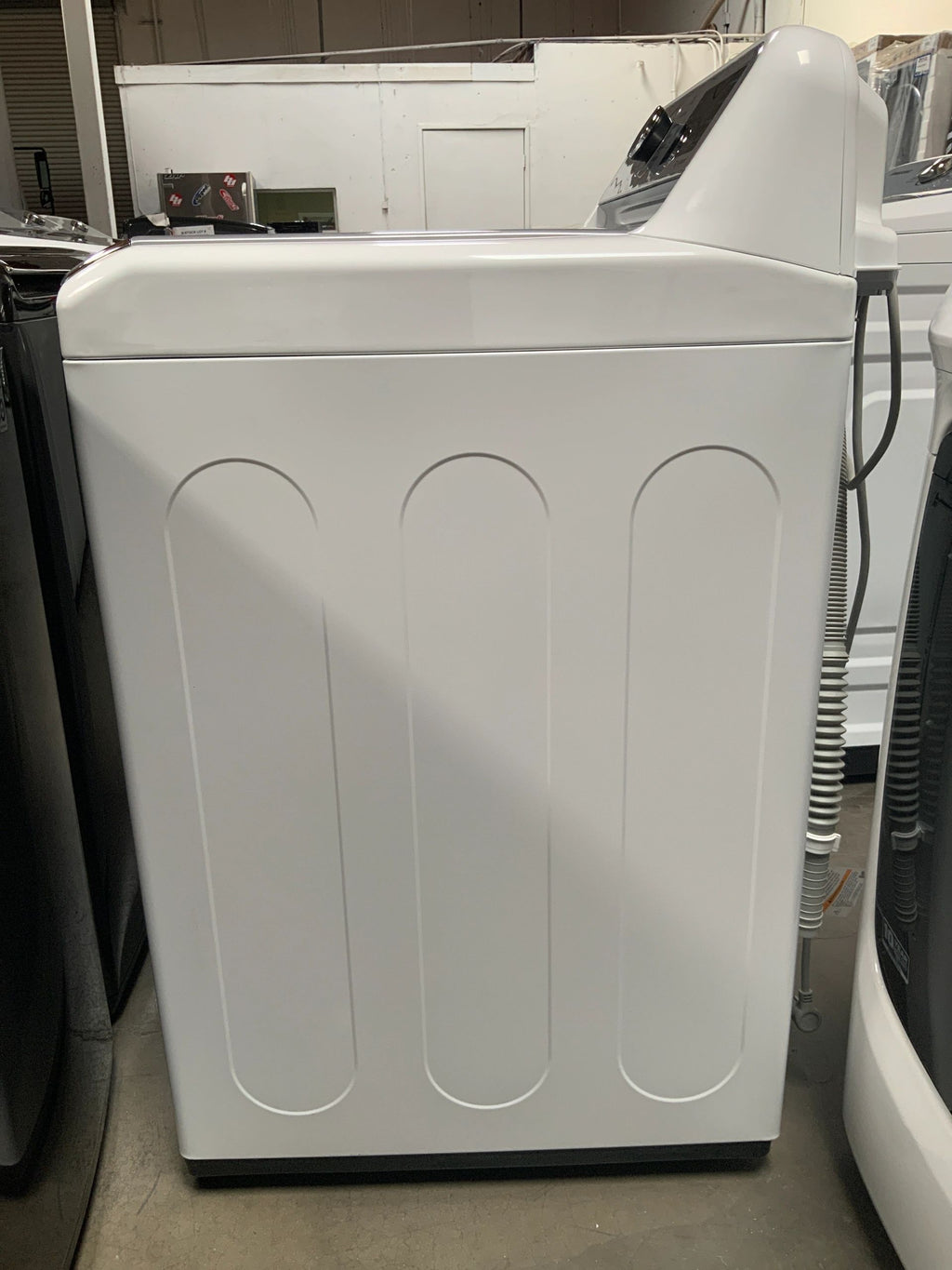New Open Box. 27 in. 4.8 cu. ft. Mega Capacity White Top Load Washer, Agitator, with TurboWash3D and Wi-Fi Connectivity. Model: WT7305CW