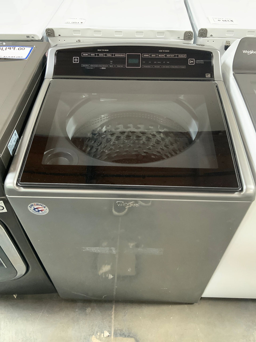 New Open Box. 4.8 cu. ft. High-Efficiency Chrome Shadow Top Load Washer with Built-In Water Faucet in Intuitive Touch Controls. Model: WTW7500GC