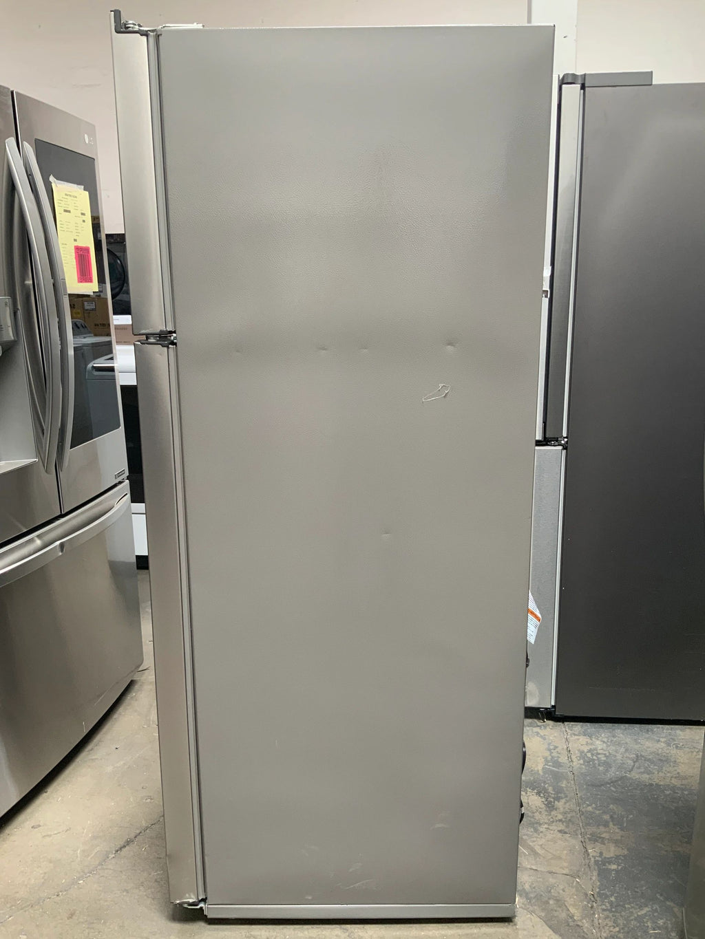 New Open Box. 18 cu. ft. Top Freezer Refrigerator in Stainless Steel. Model: WRT518SZFM