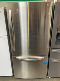 New Open Box. 24 cu. ft. Bottom Freezer Refrigerator in Stainless Steel with Multi-Air Flow and Reversible Door. Model: LDCS24223S