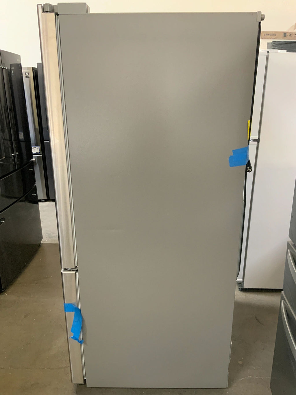 New Open Box. 24 cu. ft. Bottom Freezer Refrigerator in Stainless Steel with Multi-Air Flow and Reversible Door. Model: LDCS24223S